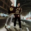 A.I.9 AFRICAN INTELLIGENCE GUILDED LEOPARD – SANDFLOWER COLLAB VARSITY JACKET