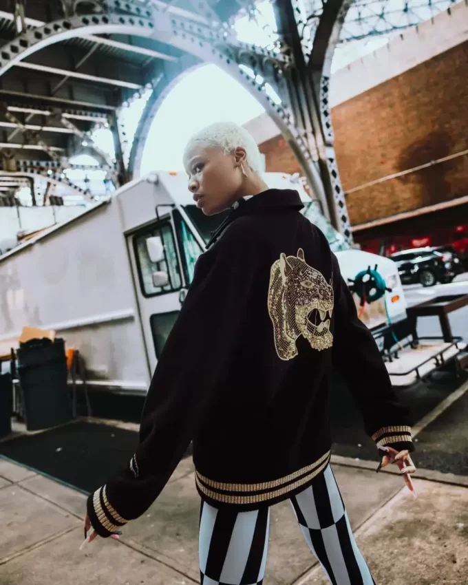 A.I.9 AFRICAN INTELLIGENCE GUILDED LEOPARD – SANDFLOWER COLLAB VARSITY JACKET