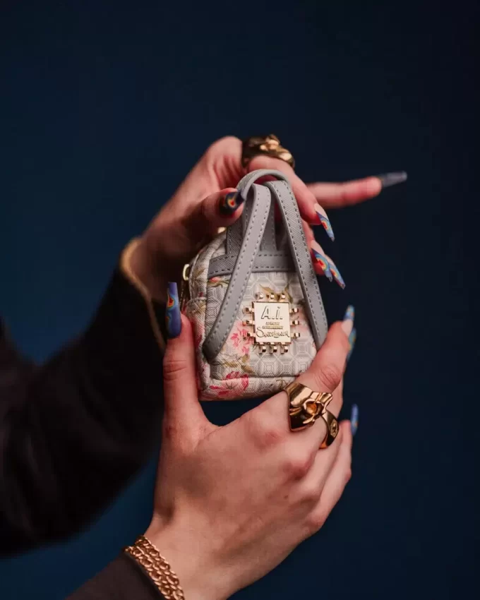 A.I. AFRICAN INTELLIGENCE ELEGANT ENERGY BACKPACK KEYCHAIN A.I. AFRICAN INTELLIGENCE ELEGANT ENERGY BACKPACK KEYCHAIN