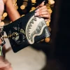 A.I. AFRICAN INTELLIGENCE SHARKS OF THE GOLD OCEAN CROSSOVER CLUTCH – SANDFLOWER COLLAB A.I. AFRICAN INTELLIGENCE SHARKS OF THE GOLD OCEAN CROSSOVER CLUTCH – SANDFLOWER COLLAB