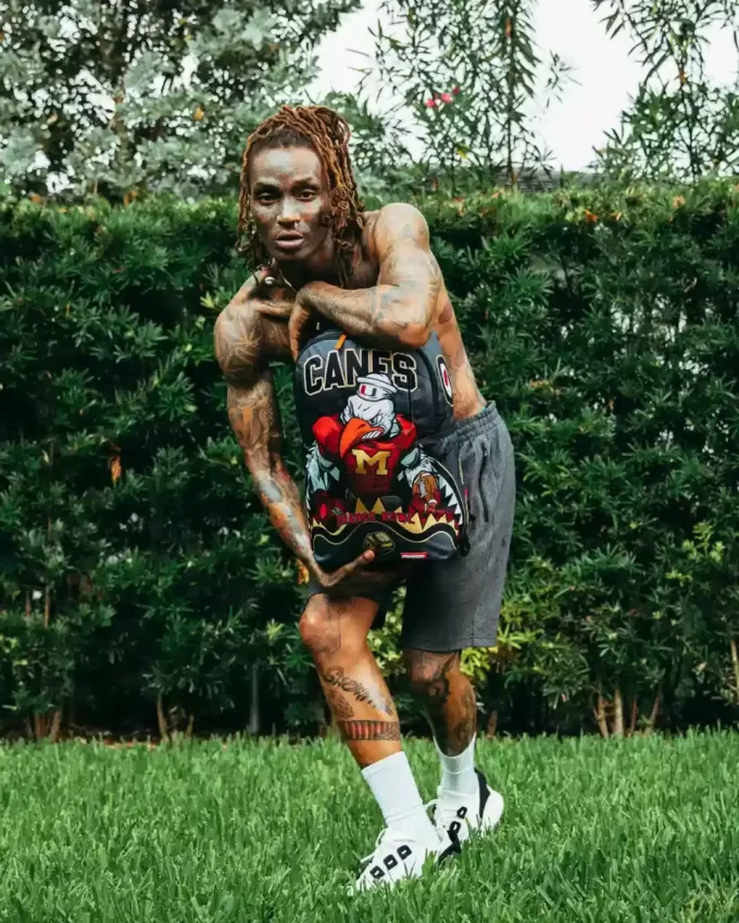 CANES MUSCLE UNIVERSITY OF MIAMI BACKPACK (WITH WARREN SAPP) CANES MUSCLE UNIVERSITY OF MIAMI BACKPACK (WITH WARREN SAPP)