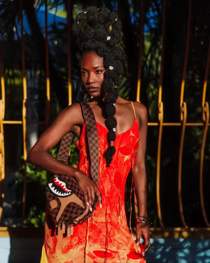 HENNYVILLE BACKPACK SLING HENNYVILLE BACKPACK SLING