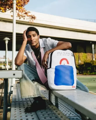 KEITH HARING BIG BLUE PURSE ART BACKPACK