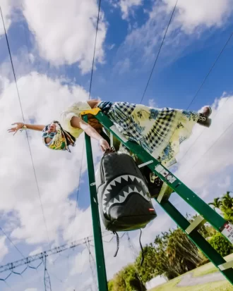 LIGHTS OUT SHARKS IN PARIS BACKPACK