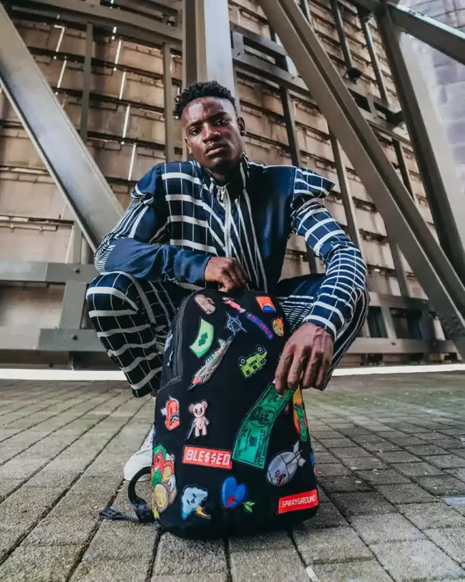 THE 32 REMOVABLE PATCHES VELCRO BACKPACK THE 32 REMOVABLE PATCHES VELCRO BACKPACK