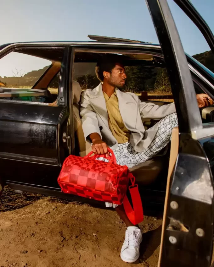 XTC SHARKS IN WONDERLAND MINI DUFFLE XTC SHARKS IN WONDERLAND MINI DUFFLE